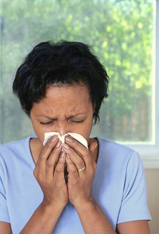 Woman Sneezing